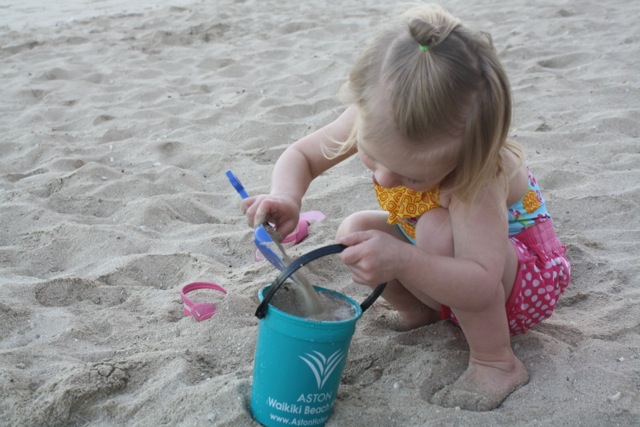 This little girl just loved playing in this huge sandbox.