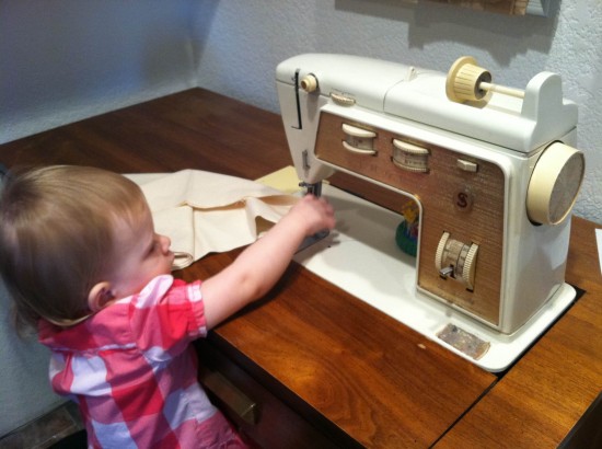 Ellie sewing on her Great Grandmother Myrna's sewing machine.