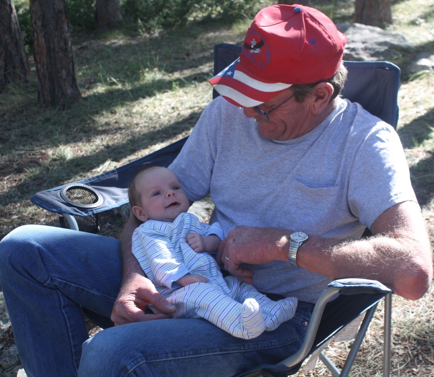 Sitting at camp with Grandpa Doug.