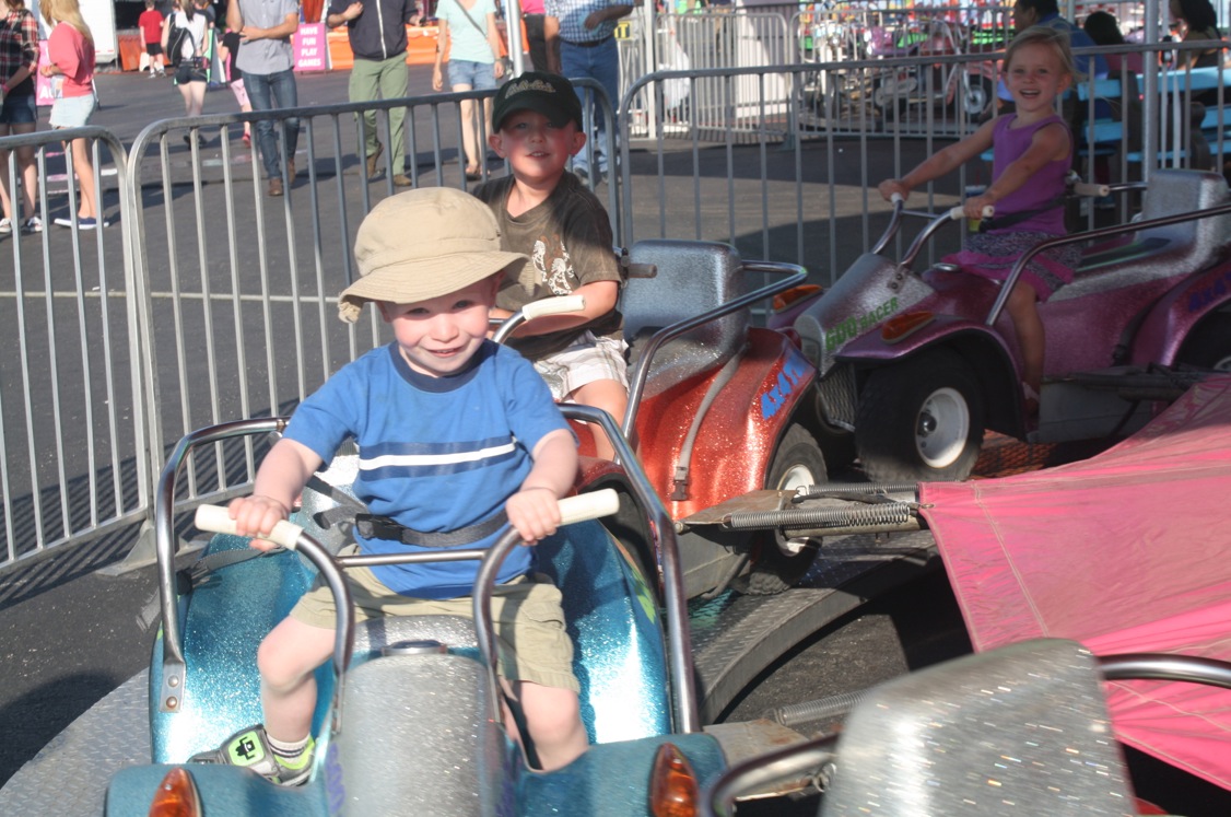 Fun for all ages! - Adam, Same and Ellie on the 4-wheelers.