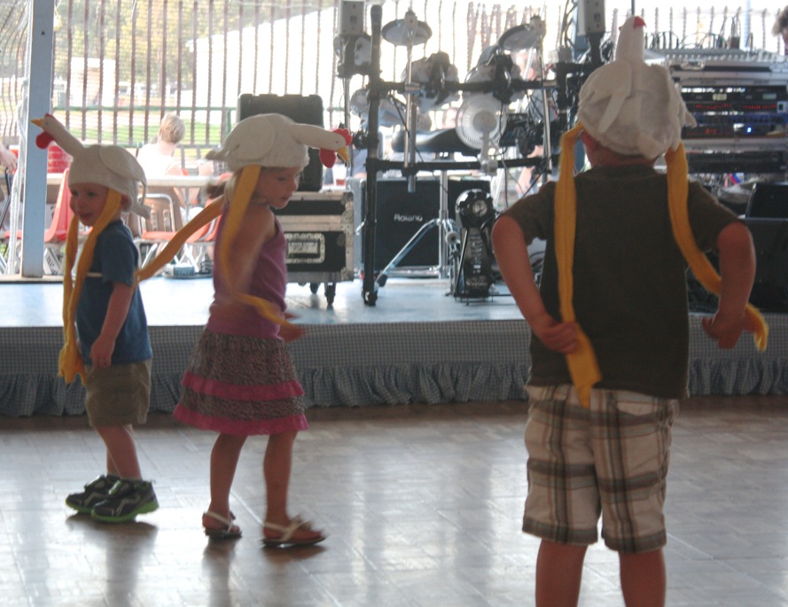 The chicken dance in the German tent with fun chicken hats from Sam's grandma.