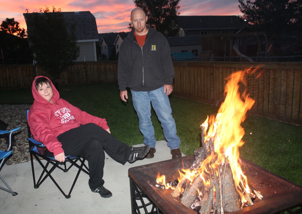 Enjoying a sunset campfire.