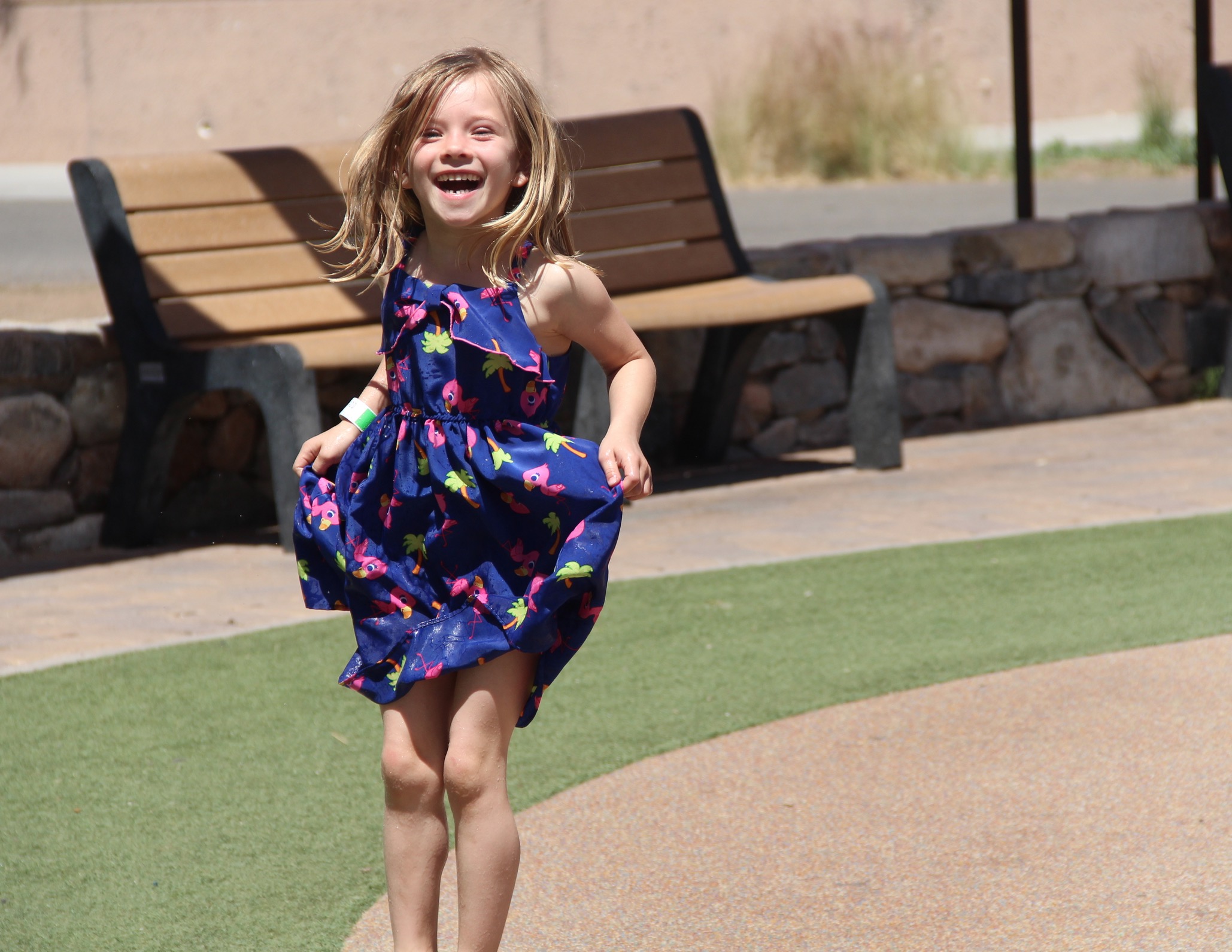 Big smiles while cooling of in the Zoo's splash park.