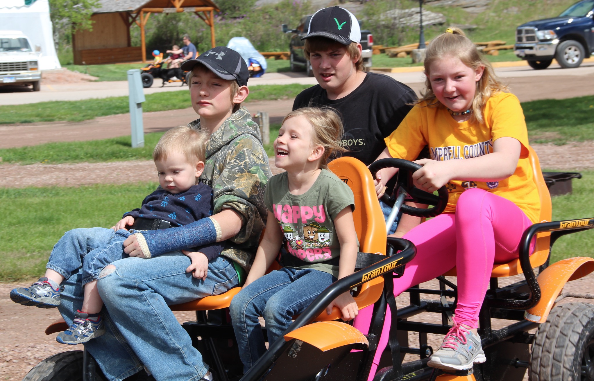 Zooming around with their cousins.